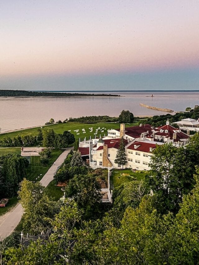 View from above of the grounds of Mission Point Resort as well as a boat on Lake Huron
