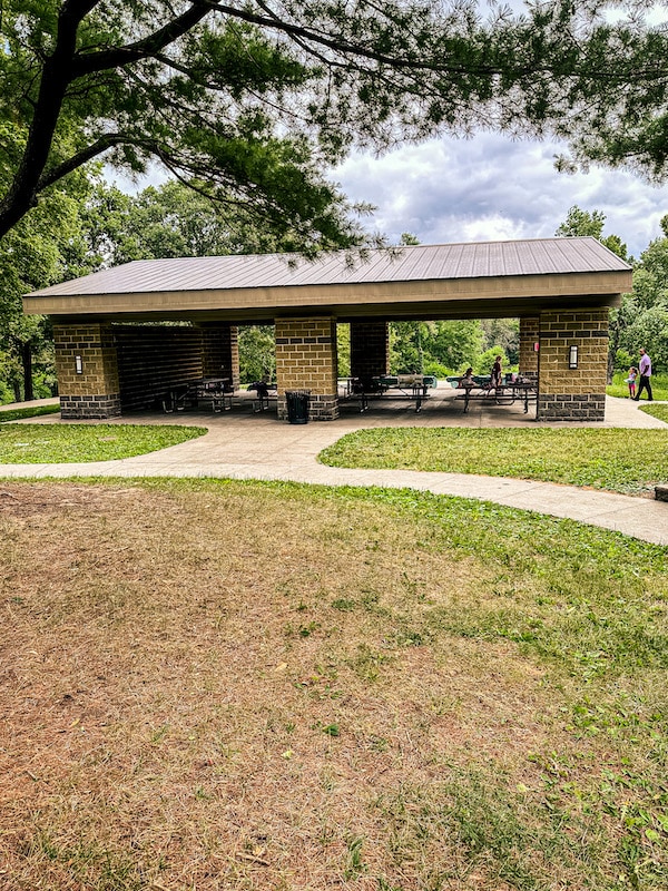 Pearson Park shelter with a sidewalk leading up to it.