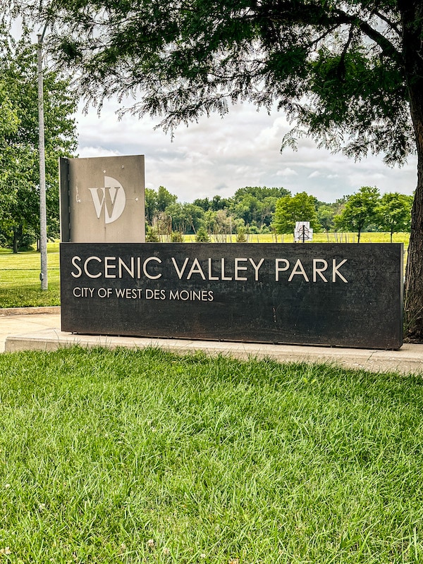 Brown and tan sign for Scenic Valley Park in the city of West Des Moines.