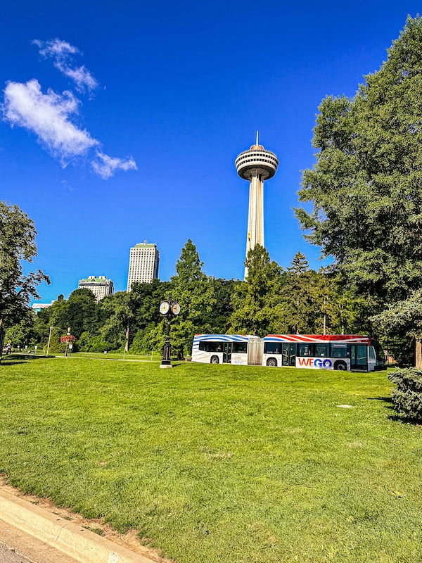 View of the Skylon Tower in the distance with the WEGO bus in the foreground.