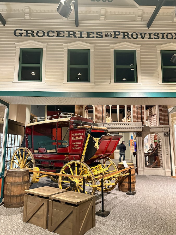 Red mail stagecoach located inside of the Durham Museum.