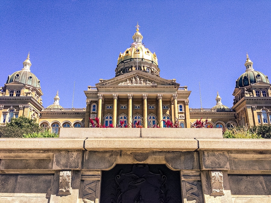 View looking up at the exterior of the Iowa State Capitol building.