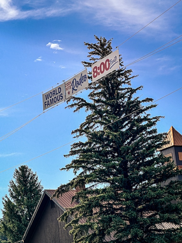 Cody Nite Rodeo sign advertising the nightly 8:00 p.m. rodeo in Cody, Wyoming.