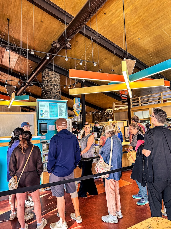 Visitors waiting in line at Falls Cafe inside Canyon Lodge in Yellowstone National Park.